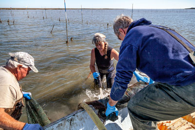 Clamming in bull's bay with julie mcclellan, erwin ashley and george couch.