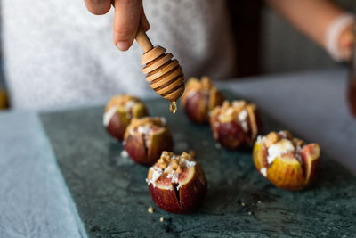 Close-up of person preparing food