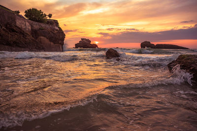 Scenic view of sea against sky during sunset