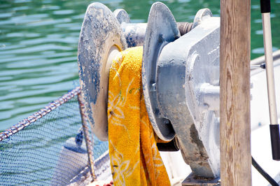 Close-up of rope on wooden post