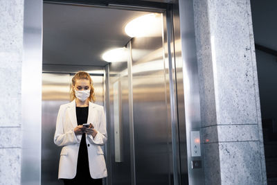 Young woman using mobile phone