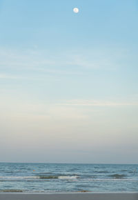 Scenic view of sea against sky at sunset