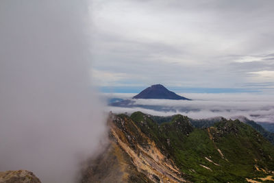 Scenic view of volcanic landscape against sky