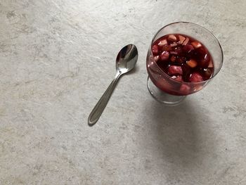 High angle view of raspberries in bowl on table