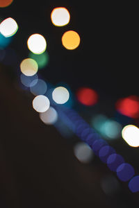 Defocused image of illuminated lights at night
