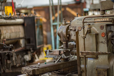 Close-up of old machine part in factory