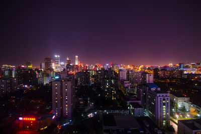 High angle shot of illuminated cityscape at night