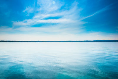 Scenic view of sea against blue sky