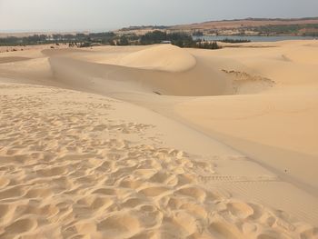 Scenic view of desert against sky