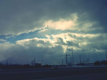 Scenic view of landscape against cloudy sky