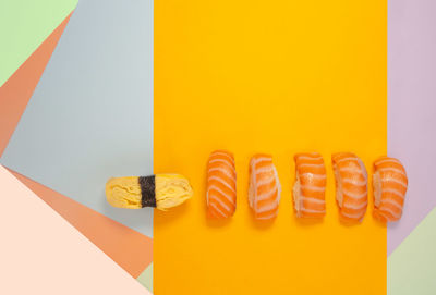 Directly above shot of multi colored pencils on white background