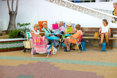 People sitting on floor