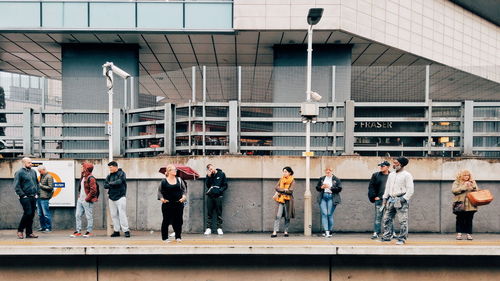 Group of people standing outside building