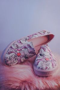 Close-up of woman with pink face at home