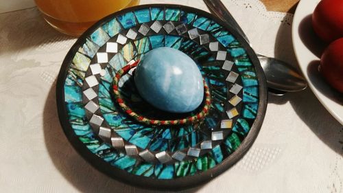 High angle view of multi colored bowl on table