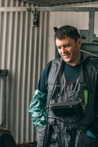 Veterinarian, equipped with ultrasound device, stands guard over the health, advanced technology