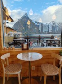 Empty chairs and tables in restaurant