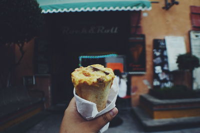 Close-up of hand holding food