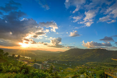 Scenic view of landscape against sky during sunset