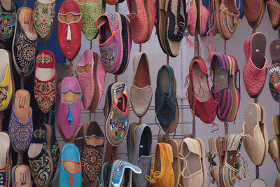 Full frame shot of shoes for sale at market