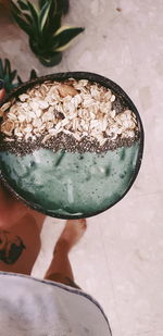 Close-up of hand holding drink