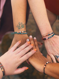 Midsection of woman with hands