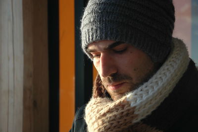 Close-up portrait of woman in winter