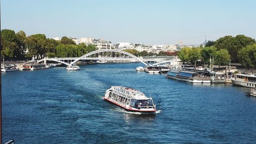 View of bridge over river in city