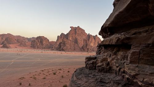 Rock formations in desert against sky