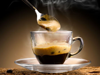 Close-up of coffee in cup on table