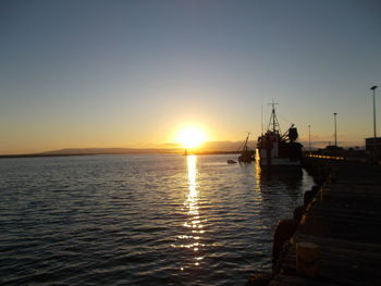 Scenic view of sea at sunset