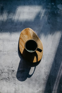 High angle view of coffee cup on table