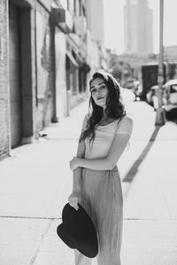 Woman standing in front of building