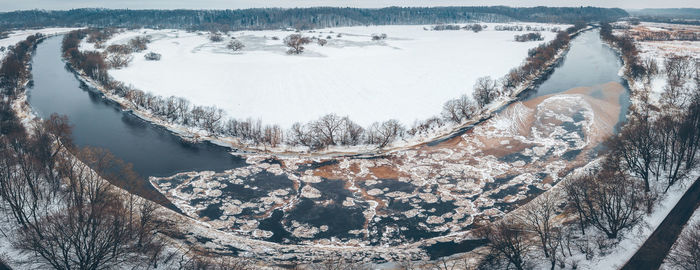 Close-up of frozen lake against sky