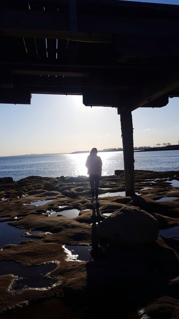 water, sea, standing, horizon over water, full length, silhouette, tranquil scene, scenics, vacations, tranquility, solitude, sky, nature, outdoors, shore, loneliness, hobbies, alone