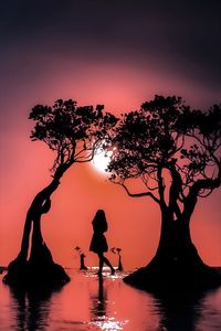 Silhouette people by tree against sky during sunset