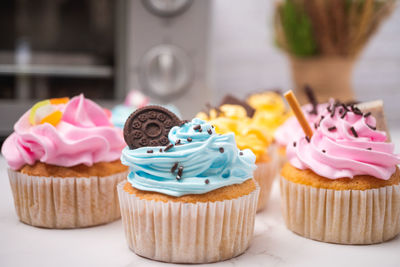 Close-up of cupcakes on table