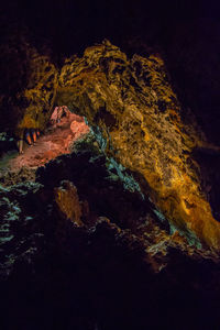 Low angle view of rock formations at night