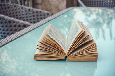 High angle view of open book on table