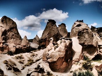 Panoramic view of rocks and mountains against sky