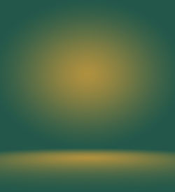 Defocused image of yellow lights against sky