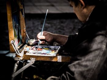 Cropped image of woman looking at camera