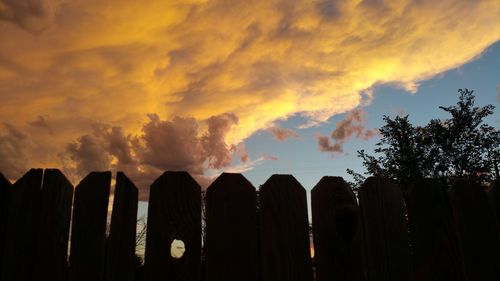 Scenic view of cloudy sky at sunset