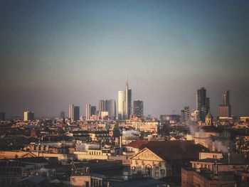 View of cityscape against sky during sunset