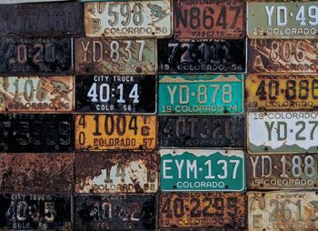 Close-up of old rusty license plates 