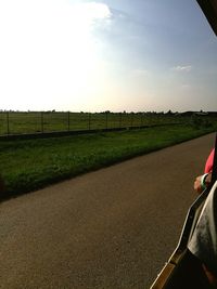 Country road on grassy field