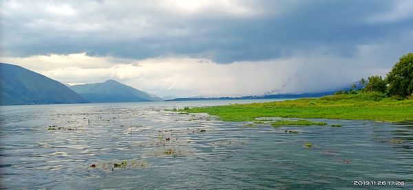 Scenic view of lake against sky