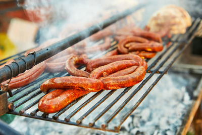 Close-up of meat on barbecue grill