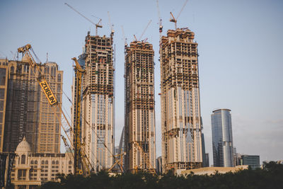 Panoramic view of skyscrapers against clear sky