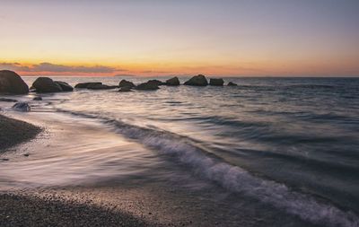 Scenic view of beach during sunset